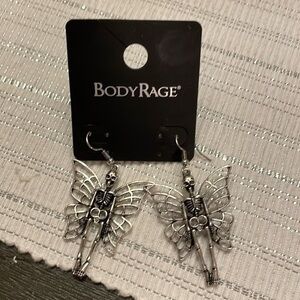 Body Rage Winged Skelton Pierced Earrings